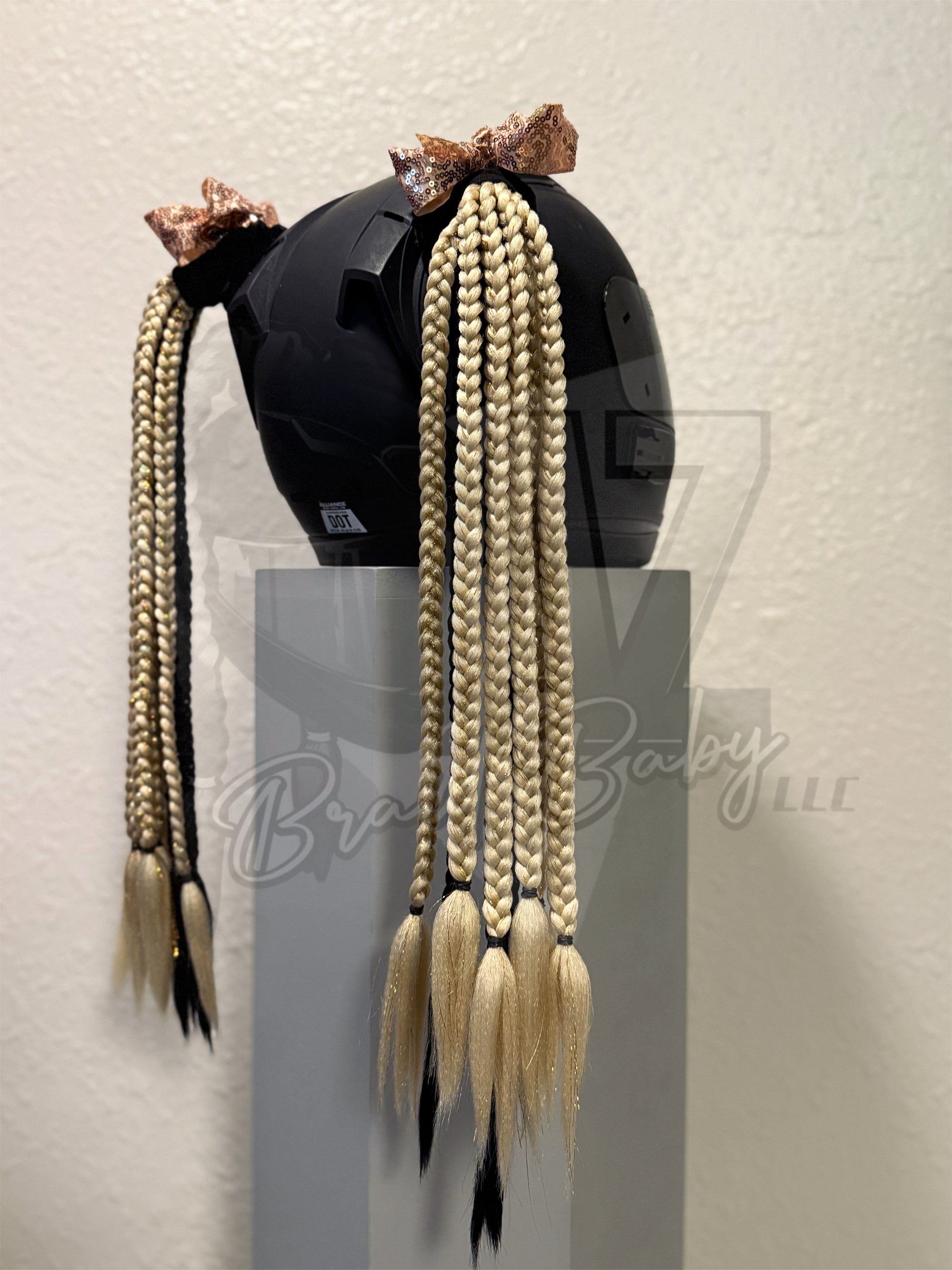 Custom motorcycle helmet braids featuring gold and black braids with color matching tinsel and sequin bows 