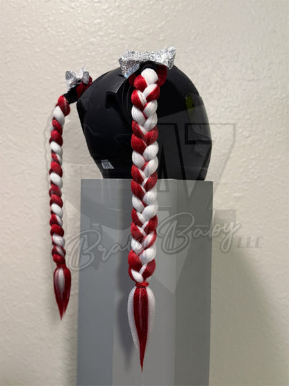 Custom motorcycle helmet braids featuring red and white synthetic hair with red tinsel and white sequin bows